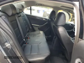 2017 Volkswagen Jetta SEL z VIN 3VWL17AJ9HM407735, wystawiony jako Copart lot #60257715 z przebiegiem 124 393 mil mil oraz Czysty tytuł • Clean title. Historia ofert i sprzedaży dostępna na DreamBid. Obrazek 10.