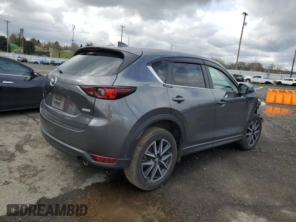 2018 Mazda CX-5 Touring with VIN JM3KFBCM1J0372702, listed as a Copart auction lot 49714595 with 107,805 mi miles and Salvage Title. Bid and sale history available at carsss.com. Image 3.