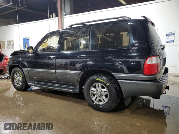 2002 Lexus LX 470 z VIN JTJHT00W023515545, wystawiony jako Copart lot #79218054 z przebiegiem 310 334 mil mil oraz Szkoda całkowita • Salvage title. Historia ofert i sprzedaży dostępna na DreamBid. Obrazek 2.