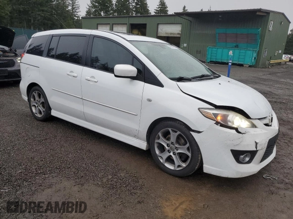 2009 Mazda 5 Grand Touring with VIN JM1CR293990341566, listed as a Copart auction lot 44239225 with 149,493 mi miles and Salvage title. Bid and sale history available at DreamBid. Image 4.