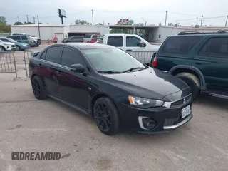 2016 Mitsubishi Lancer GT with VIN JA32U8FW8GU011501, listed as a IAAI auction lot 41779016 with 153,082 mi miles. Bid and sale history available at carsss.com. Image 1.