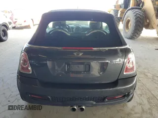2013 MINI Convertible S z VIN WMWZP3C56DT705270, wystawiony jako Copart lot #62717625 z przebiegiem 85 388 mil mil oraz Czysty tytuł • Clean title. Historia ofert i sprzedaży dostępna na DreamBid. Obrazek 6.