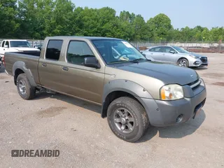 2002 Nissan Frontier XE z VIN 1N6ED29XX2C392764, wystawiony jako IAAI lot #42381542 z przebiegiem 193 919 mil mil oraz . Historia ofert i sprzedaży dostępna na DreamBid. Obrazek 1.