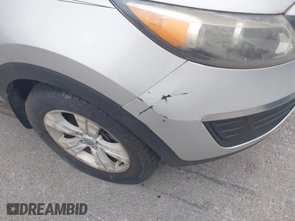 2012 Kia Sportage LX with VIN KNDPBCA24C7214432, listed as a IAAI auction lot 42530116 with 127,623 mi miles and . Bid and sale history available at DreamBid. Image 6.