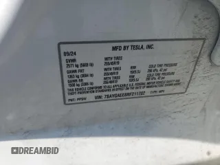 2024 Tesla Model Y Long Range z VIN 7SAYGAEE8RF211702, wystawiony jako Copart lot #58569035 z przebiegiem 8 797 mil mil oraz Szkoda całkowita • Salvage title. Historia ofert i sprzedaży dostępna na DreamBid. Obrazek 12.