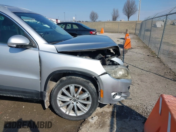 2011 Volkswagen Tiguan SE with VIN WVGBV7AX2BW562055, listed as a IAAI auction lot 41642084 with 175,407 mi miles and . Bid and sale history available at DreamBid. Image 19.