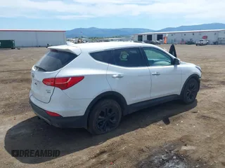 2016 Hyundai Santa Fe z VIN 5XYZTDLB9GG364375, wystawiony jako IAAI lot #42203404 z przebiegiem 143 838 mil mil oraz . Historia ofert i sprzedaży dostępna na DreamBid. Obrazek 4.