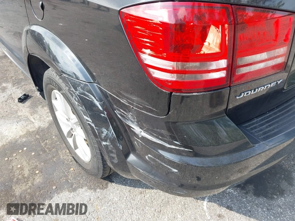 2013 Dodge Journey SE with VIN 3C4PDCAB0DT710609, listed as a IAAI auction lot 41763431 with 145,851 mi miles and . Bid and sale history available at DreamBid. Image 16.