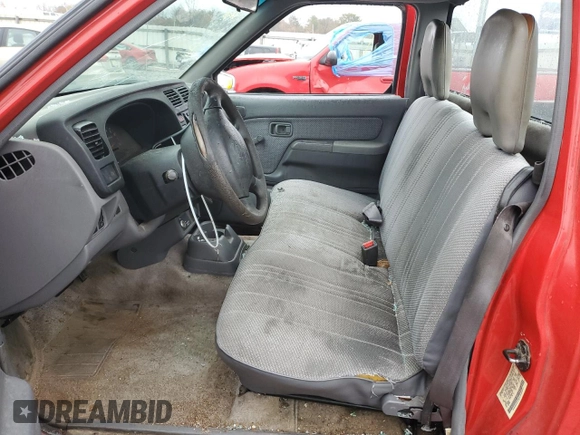 2000 Nissan Frontier XE z VIN 1N6DD21S8YC338304, wystawiony jako Copart lot #83990454 z przebiegiem 184 467 mil mil oraz Szkoda całkowita • Salvage title. Historia ofert i sprzedaży dostępna na DreamBid. Obrazek 7.