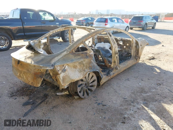 2022 Tesla Model 3 Performance with VIN 5YJ3E1EC3NF320980, listed as a IAAI auction lot 41450357 with Not Provided miles and . Bid and sale history available at DreamBid. Image 4.