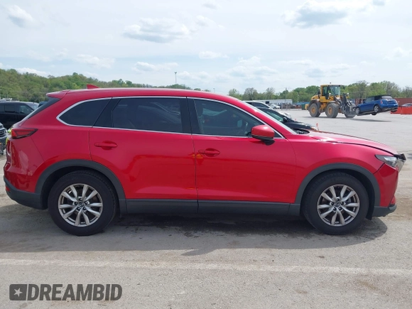 2016 Mazda CX-9 Touring with VIN JM3TCACY4G0112961, listed as a IAAI auction lot 42094718 with 114,679 mi miles and . Bid and sale history available at DreamBid. Image 13.