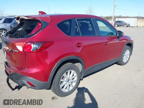 2013 Mazda CX-5 Touring with VIN JM3KE4CE7D0165324, listed as a IAAI auction lot 41879800 with 31,912 mi miles. Bid and sale history available at carsss.com. Image 4.