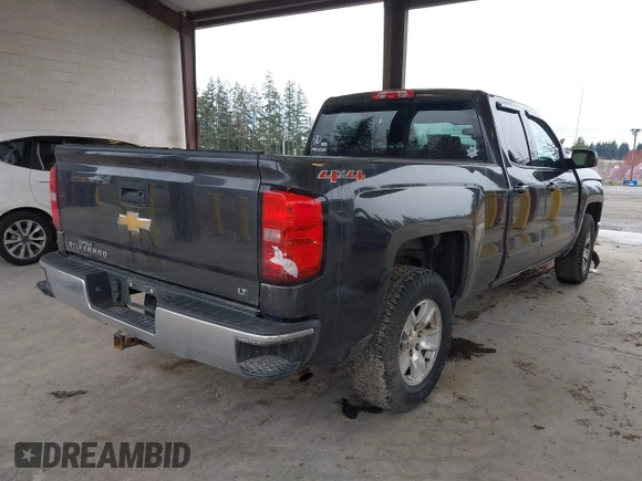 2015 Chevrolet Silverado 1500 LT with VIN 1GCVKREC3FZ430536, listed as a IAAI auction lot 41910194 with 131,541 mi miles. Bid and sale history available at carsss.com. Image 4.