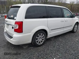 2012 Chrysler Town & Country Touring L with VIN 2C4RC1CG6CR137841, listed as a IAAI auction lot 41951936 with 264,211 mi miles and . Bid and sale history available at carsss.com. Image 4.