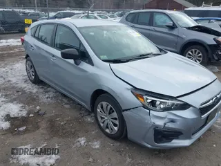2018 Subaru Impreza with VIN 4S3GTAA65J1740704, listed as a IAAI auction lot 41723889 with 53,679 mi miles. Bid and sale history available at carsss.com. Image 1.