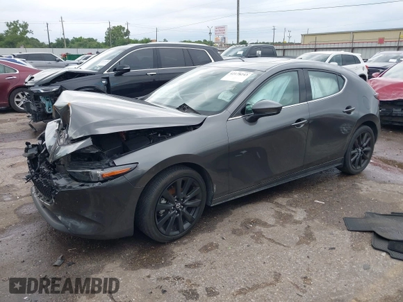 2021 Mazda 3 Premium z VIN JM1BPAML1M1318708, wystawiony jako IAAI lot #42178243 z przebiegiem 62 455 mil mil oraz . Historia ofert i sprzedaży dostępna na DreamBid. Obrazek 2.