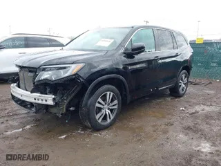 2016 Honda Pilot EX-L with VIN 5FNYF6H5XGB010700, listed as a IAAI auction lot 41895396 with 137,153 mi miles. Bid and sale history available at carsss.com. Image 2.