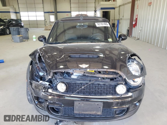 2012 MINI Convertible S с VIN WMWZP3C51CT296318, выставлен на аукционе Copart как лот 47701405 с пробегом 78 842 миль миль и Списание • Salvage title. История ставок и продаж доступна на DreamBid. Изображение 5.