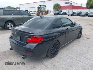 2015 BMW 2 Series M235i with VIN WBA1J7C5XFV289284, listed as a IAAI auction lot 42626668 with 179,944 mi miles and . Bid and sale history available at DreamBid. Image 4.