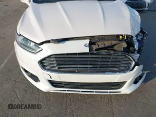 2015 Ford Fusion SE Hybrid with VIN 3FA6P0LU2FR305597, listed as a IAAI auction lot 42168292 with 97,688 mi miles and . Bid and sale history available at DreamBid. Image 6.