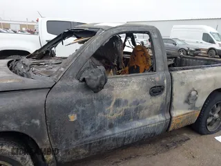 1998 Dodge Dakota SLT with VIN 1B7FL26X6WS656704, listed as a IAAI auction lot 41418285 with Not provided miles and . Bid and sale history available at DreamBid. Image 6.