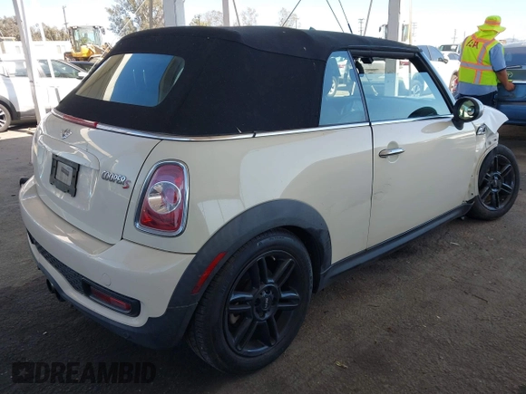 2014 MINI Convertible S with VIN WMWZP3C5XET706911, listed as a IAAI auction lot 42217410 with 54,649 mi miles and . Bid and sale history available at DreamBid. Image 4.
