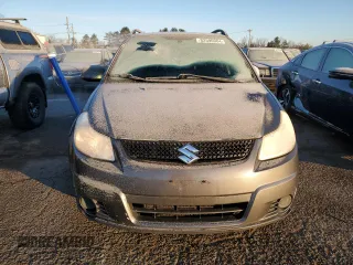 2010 Suzuki SX4 with VIN JS2YB5A31A6300055, listed as a Copart auction lot 82596904 with 80,715 mi miles and Salvage Title. Bid and sale history available at carsss.com. Image 5.