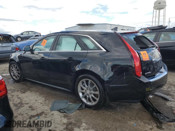 2014 Cadillac CTS with VIN 1G6DH8E3XE0134312, listed as a Copart auction lot 61556874 with 77,194 mi miles and Salvage Title. Bid and sale history available at DreamBid. Image 2.