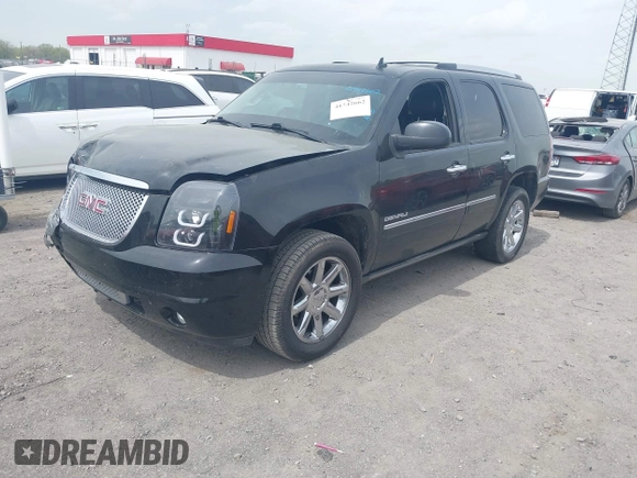 2014 GMC Yukon Denali z VIN 1GKS1EEFXER113493, wystawiony jako IAAI lot #41742662 z przebiegiem 150 382 mil mil oraz . Historia ofert i sprzedaży dostępna na DreamBid. Obrazek 19.