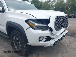 2023 Toyota Tacoma SR with VIN 3TMCZ5AN1PM556299, listed as a IAAI auction lot 42344160 with 42,338 mi miles and . Bid and sale history available at DreamBid. Image 18.
