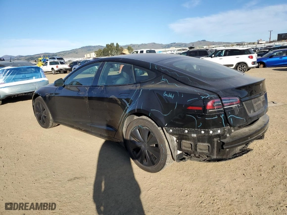 2022 Tesla Model S with VIN 5YJSA1E54NF492329, listed as a Copart auction lot 87954325 with 50232 miles and Salvage Title. Bid and sale history available at carsss.com. Image 2.