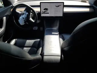 2021 Tesla Model Y Performance with VIN 5YJYGDEF9MF268006, listed as a Copart auction lot 49082695 with 69,743 mi miles and Salvage Title. Bid and sale history available at DreamBid. Image 8.