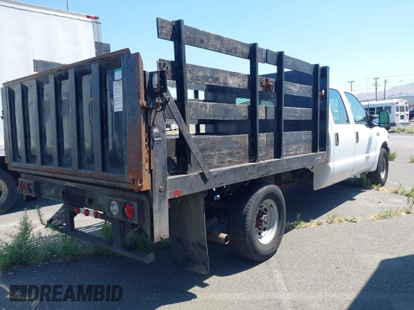 1999 Ford F-350 z VIN 1FDSW34S6XEE06653, wystawiony jako IAAI lot #42697070 z przebiegiem 194 164 mil mil oraz . Historia ofert i sprzedaży dostępna na DreamBid. Obrazek 4.