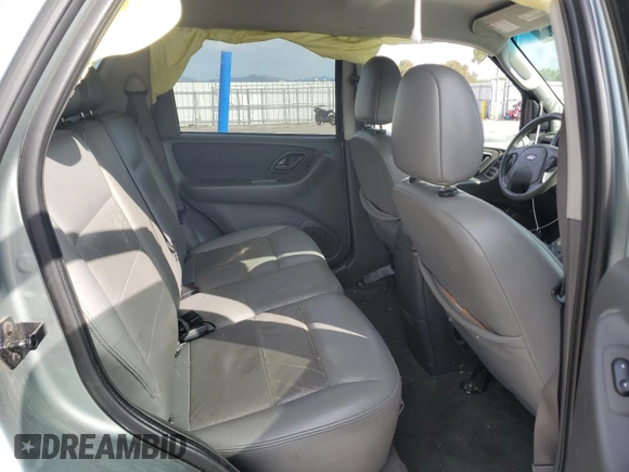 2005 Ford Escape Hybrid z VIN 1FMCU95HX5KE24619, wystawiony jako Copart lot #60624765 z przebiegiem 209 937 mil mil oraz Nie do naprawy • Non repairable. Historia ofert i sprzedaży dostępna na DreamBid. Obrazek 11.