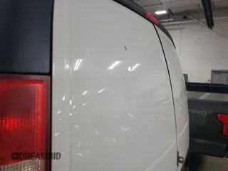 2014 Chevrolet Express Cargo Van with VIN 1GCWGFFA8E1126536, listed as a IAAI auction lot 42088230 with 170,083 mi miles. Bid and sale history available at carsss.com. Image 1.
