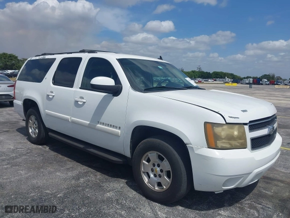 2009 Chevrolet Suburban LT w/2LT with VIN 1GNFC26JX9J108623, listed as a IAAI auction lot 42115456 with 144,370 mi miles. Bid and sale history available at carsss.com. Image 1.