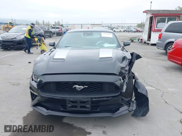 2022 Ford Mustang EcoBoost with VIN 1FA6P8THXN5145312, listed as a IAAI auction lot 42075186 with 28,233 mi miles and . Bid and sale history available at DreamBid. Image 6.