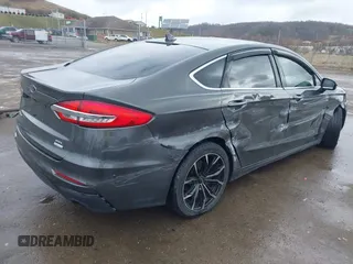 2019 Ford Fusion SEL with VIN 3FA6P0CD6KR141832, listed as a IAAI auction lot 41800102 with 142,282 mi miles and . Bid and sale history available at DreamBid. Image 4.