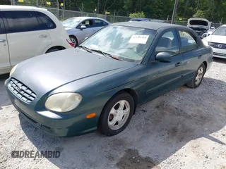 1999 Hyundai Sonata GLS with VIN KMHWF35V6XA107973, listed as a IAAI auction lot 42119318 with 174,231 mi miles. Bid and sale history available at carsss.com. Image 2.