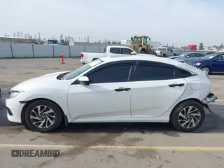 2016 Honda Civic EX with VIN 19XFC2F72GE097060, listed as a IAAI auction lot 41626940 with 156,941 mi miles and . Bid and sale history available at DreamBid. Image 15.