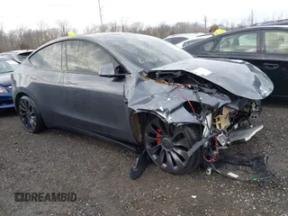 2023 Tesla Model Y Performance z VIN 7SAYGDEFXPF880285, wystawiony jako IAAI lot #41245126 z przebiegiem Nie podano mil oraz . Historia ofert i sprzedaży dostępna na DreamBid. Obrazek 1.