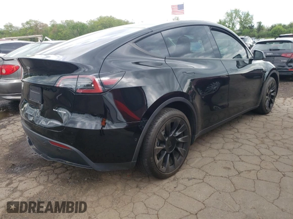 2022 Tesla Model Y Long Range z VIN 7SAYGDEEXNA008898, wystawiony jako Copart lot #54915445 z przebiegiem 35 467 mil mil oraz Szkoda całkowita • Salvage title. Historia ofert i sprzedaży dostępna na DreamBid. Obrazek 3.