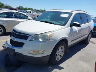 2012 Chevrolet Traverse LS z VIN 1GNKREED8CJ125437, wystawiony jako IAAI lot #42073517 z przebiegiem 48 433 mil mil oraz . Historia ofert i sprzedaży dostępna na DreamBid. Obrazek 2.