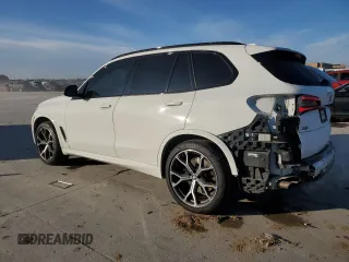 2020 BMW X5 M50i with VIN 5UXJU4C01LLE45993, listed as a Copart auction lot 88904235 with 64,841 mi miles and Salvage Title. Bid and sale history available at DreamBid. Image 2.