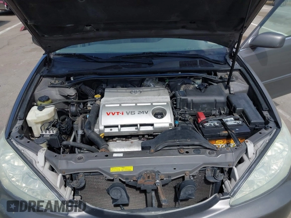 2005 Toyota Camry LE with VIN 4T1BF32K35U590150, listed as a IAAI auction lot 42053337 with 180,627 mi miles and . Bid and sale history available at DreamBid. Image 10.