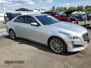 2017 Cadillac CTS Luxury AWD z VIN 1G6AX5SS1H0115619, wystawiony jako Copart lot #56017455 z przebiegiem 93 397 mil mil oraz Szkody całkowita. Historia ofert i sprzedaży dostępna na DreamBid. Obrazek 4.