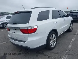 2013 Dodge Durango Crew with VIN 1C4RDJDG4DC518156, listed as a IAAI auction lot 42516880 with 162,402 mi miles and . Bid and sale history available at DreamBid. Image 4.