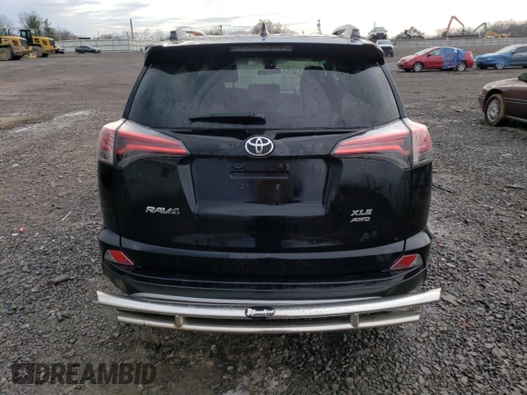 2018 Toyota RAV4 XLE with VIN 2T3RFREV6JW735352, listed as a Copart auction lot 46938025 with 73,229 mi miles and Salvage title. Bid and sale history available at DreamBid. Image 6.