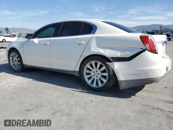 2009 Lincoln MKS with VIN 1LNHM94R79G620820, listed as a Copart auction lot 49594165 with 166,163 mi miles and Salvage Title. Bid and sale history available at DreamBid. Image 2.