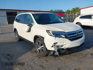2017 Honda Pilot EX-L with VIN 5FNYF6H51HB037690, listed as a IAAI auction lot 41976359 with 126,055 mi miles and . Bid and sale history available at DreamBid. Image 6.